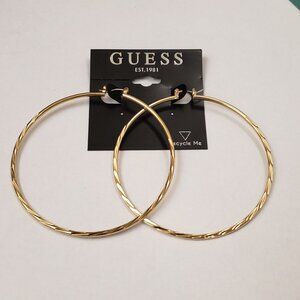 Guess, NWT, large gold tone twisted diamond cut style hoop earrings, pierced